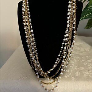 Beautiful 10 Strands with White Stones with Gold Tone hardware - 27"